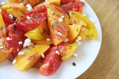 Sliced Heirloom Tomato Salad with Fresh Herbs and Feta Cheese